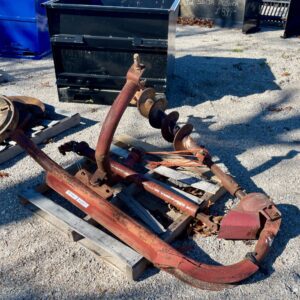 For sale, a used three point post hole auger at our outdoor sales lot.