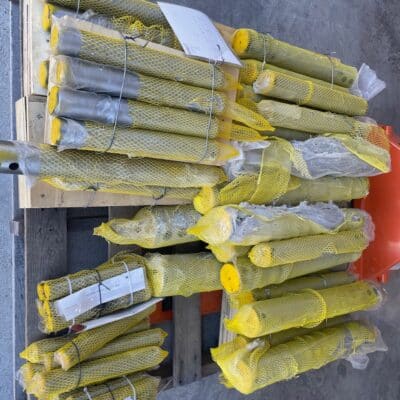 Excavator bucket pin inventory local pickup at Cliff House Buildings - Cliffhouse Buildings Excavator bucket pin inventory on pallet for local pickup at Cliff House Buildings