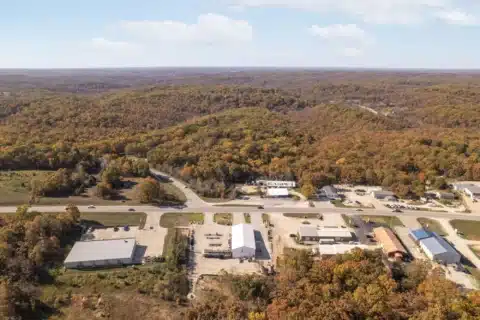 Aerial view across 706 N Main St and the surrounding commercial properties.