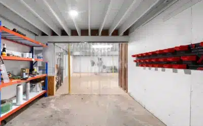 Lower-level storage bay with shelving and a clear strip divider.