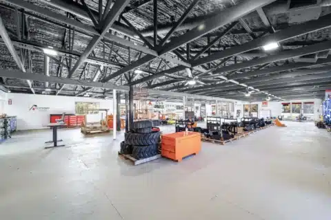 Panoramic view across the open showroom floor.