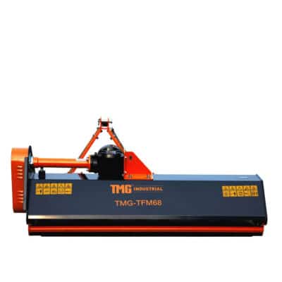 Industrial rotary mower attachment (TMG-TFM68) with orange frame and blue body, used for land clearing on tractors.