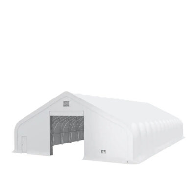 Large white inflatable tent/hangar with an open front doorway, used as a temporary shelter.