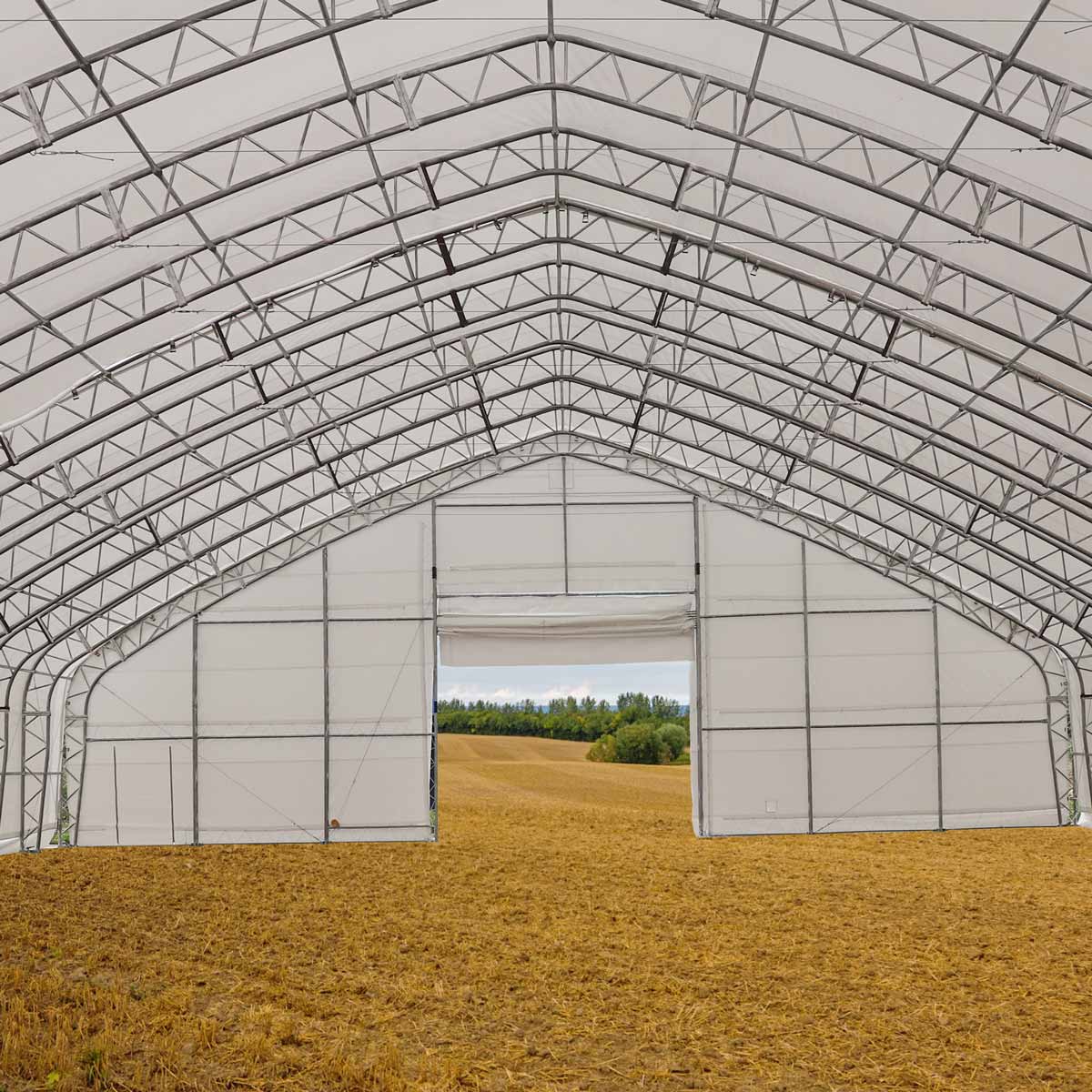 60-Wide Dual-Truss Storage Shelter with 32oz PVC Cover - Cliffhouse Buildings TMG-DT6080 TMG-DT6000 TMG Heavy Series™ 60' Wide Dual Truss Storage Shelter with Heavy Duty 32oz PVC Cover (available le